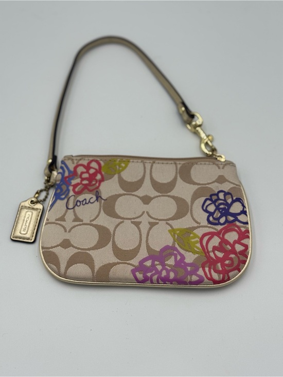 Coach Handbags - Coach Poppy Y2K Daisy wristlet with multicolored flowers